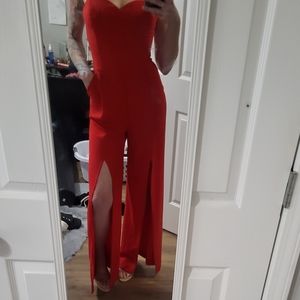 Beautiful crimson red bebe jumpsuit with sweetheart neckline/sassy slots, sz 6